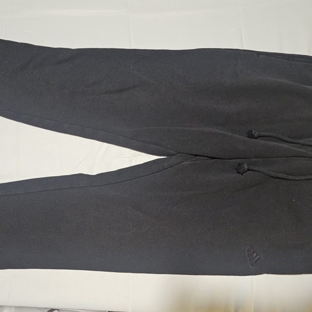 Womans Black Adidas jogger size medium. Pre-owned